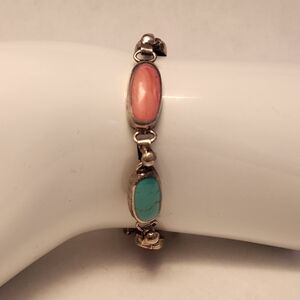 Elegant Silver Bracelet with Pink and Turquoise Accents
